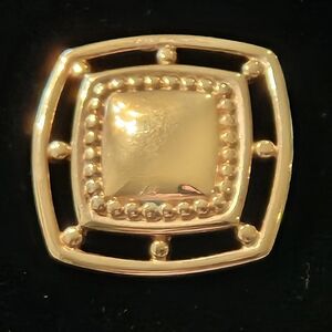 Monet goldtone brooche